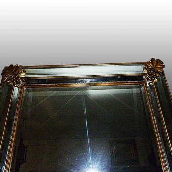 Specchio in bronzo dorato inizio XX secolo
