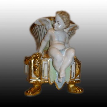 Fine porcelain putti planter marked with two swords R.B.