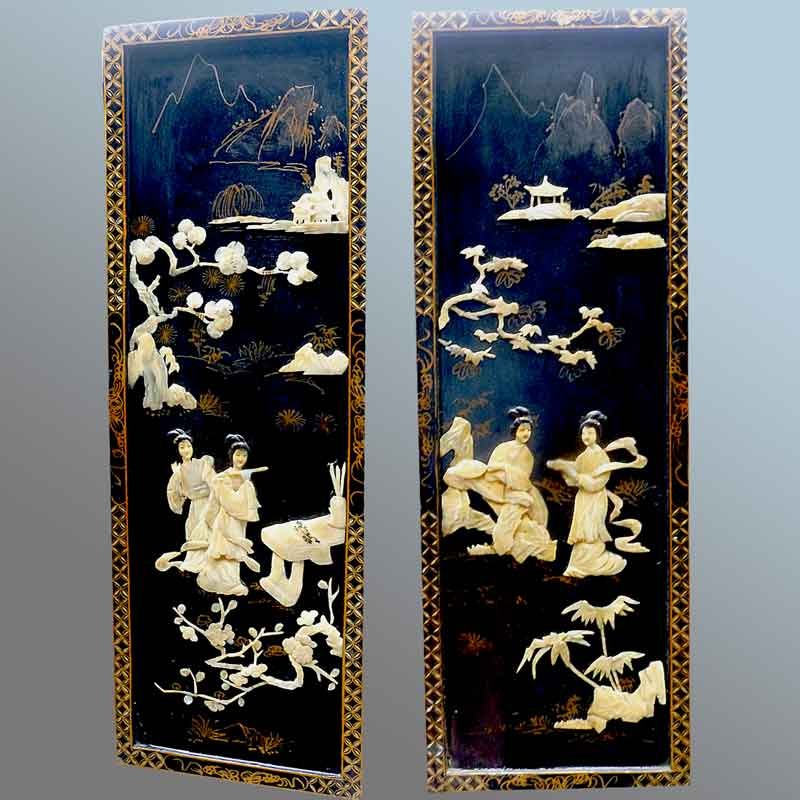 Pair of black lacquered wood panels with burgundy decoration