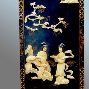 Pair of Japanese lacquered wall panels with geishas