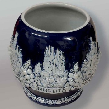 Antique German ceramic punch pot, cobalt blue, with a relief castle design