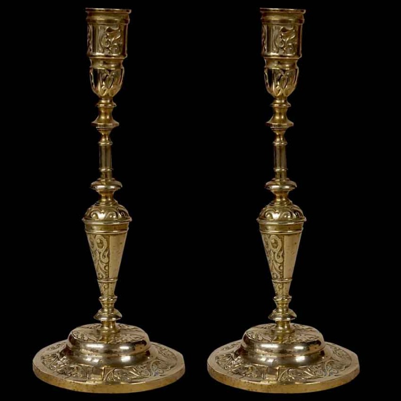 Pair of oriental ormolu candlesticks with torches