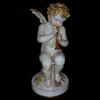 Pair of musician putti from Capodimonte, 19th century