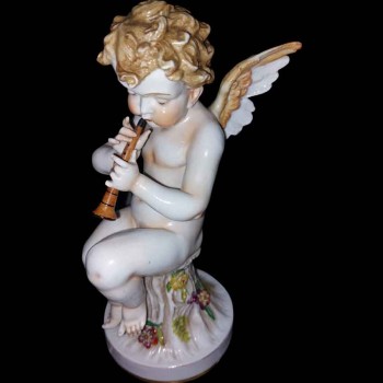 Pair of musician putti from Capodimonte, 19th century