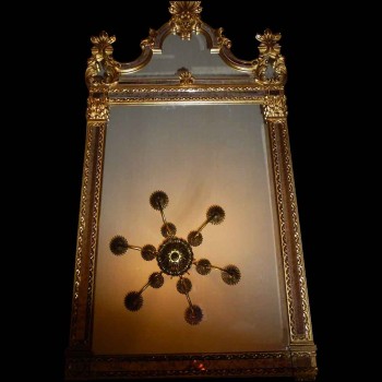 Louis XV mirror with wooden and gilded stucco panels, circa 1900